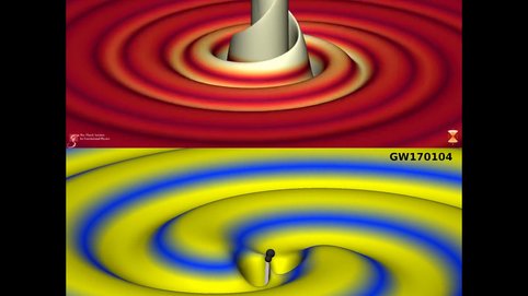 The video contrasts the two events GW150914 (upper movie panel) and GW170104 (lower movie panel).