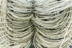 “Cable mess” near the central core switch with 768 ports connecting all servers to form a single network. Each cable is rated for 10 Gb/s.