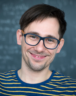 Dr. Michal P. Heller